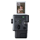 Fujifilm Instax Mini Evo Cinema printing a photo with a QR code for smartphone video playback