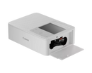 Modern white Canon SELPHY CP1500 compact printer on a desk for home photo organizing