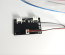 Electronic circuit board for Godox VL300 with connectors and wires on a white background