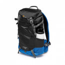 Best camera stores side view profile of the black and blue Lowepro PhotoSport BP 15L AW III hiking camera backpack with a water bottle tucked into the elastic pocket.