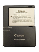 A shot of the included Canon LP-E8 battery plugged into its original charger