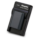 Angled profile view of the KingMa NB-2LH camera battery block securely seated inside the slim travel charging cradle.
