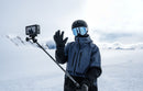 A skier captures POV footage using the DJI Osmo Action 6 mounted to their helmet.