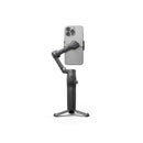 Rear angle view of a triple-camera iPhone attached to the magnetic phone clamp of the DJI Osmo Mobile 8P, available at Best Camera Store.