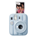Front view of the Fujifilm instax mini 13 instant camera in Frost Blue with built-in selfie mirror and dual self-timer.