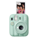 Front view of the Fujifilm instax mini 13 instant camera in Lagoon Green showing the retractable lens and flash.