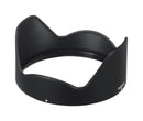 Isolated high angle view of the official black plastic petal-shaped lens hood accessory for the Fujifilm XF 16-80mm zoom lens