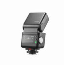 Godox X5C trigger magnetically attached to Godox iT32 mini flash