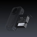 Insta360 X6 Xtreme Battery being inserted into the battery compartment of an Insta360 X6 camera from Best Camera Store.