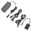 The complete KingMa LP-E12 dummy battery adapter kit containing the power brick, wall plug, coiled connection cord, and dummy battery layout, available at Best Camera Store.