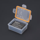Close-up of the KingMa replacement camera battery securely inside its weather-sealed clear storage case.
