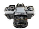 Top down view of Minolta X-70 showing pristine dials and mint shutter release.