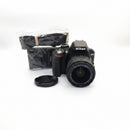 The full used Nikon D3300 bundle kit featuring the camera body, AF-P lens, original MH-24 charger block, EN-EL14 battery, and Nikon neck strap from Best Camera Store.