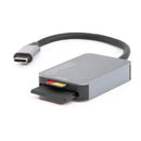Sleek grey Optex OR1000 UHS-II USB-C card reader with its integrated short cable and memory cards partially inserted into the front SD and microSD slots.