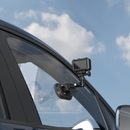 SmallRig oval vacuum suction cup camera mount attached to the curved hood of a car for automotive cinematography.
