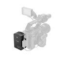 SmallRig VB99 SE mini V-mount battery mounted on a professional camera tripod rig setup.