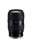 Side perspective of the Tamron 35-100mm lens highlighting the ergonomic zoom ring and sleek black finish.