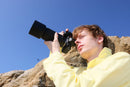 Tamron 70-300mm f/4.5-6.3 Di III RXD lens mounted on a Nikon Z full-frame mirrorless camera, sold at Best Camera Store.