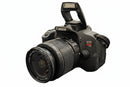 Front view of used Canon EOS Rebel T5i DSLR with 18-55mm IS lens.