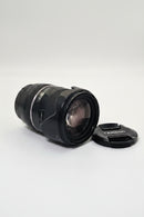 Close-up of clean front glass element on used Tamron 16-300mm VC PZD Canon lens