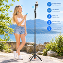 Woman controlling VIP Q575TK AI Face Tracking Tripod by the lake with wireless remote from Best Camera Store